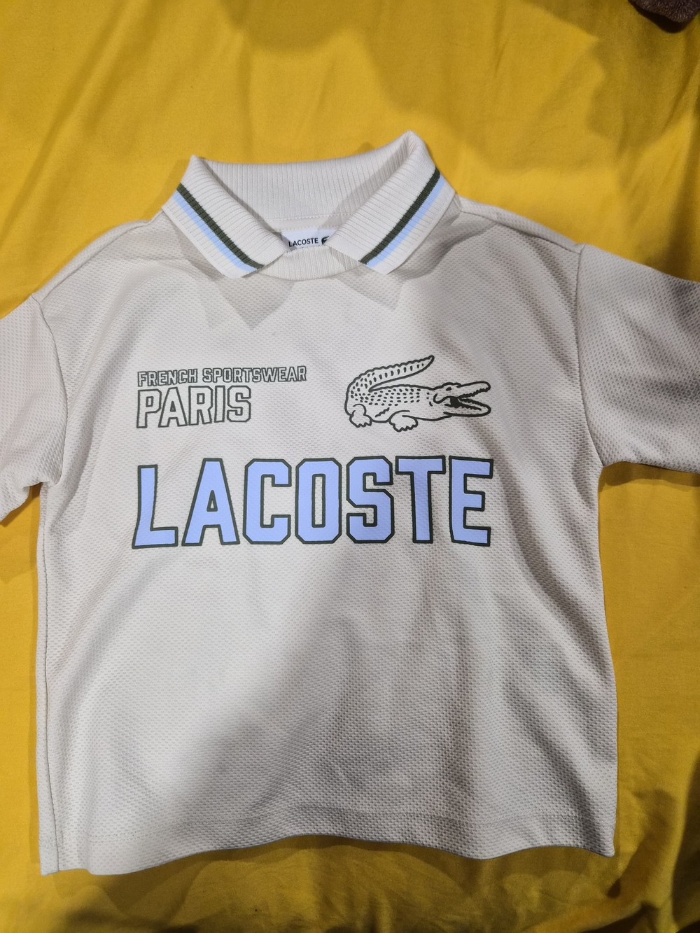#8Lacoste White Kids Polo with Light Blue Logo and Green Trim